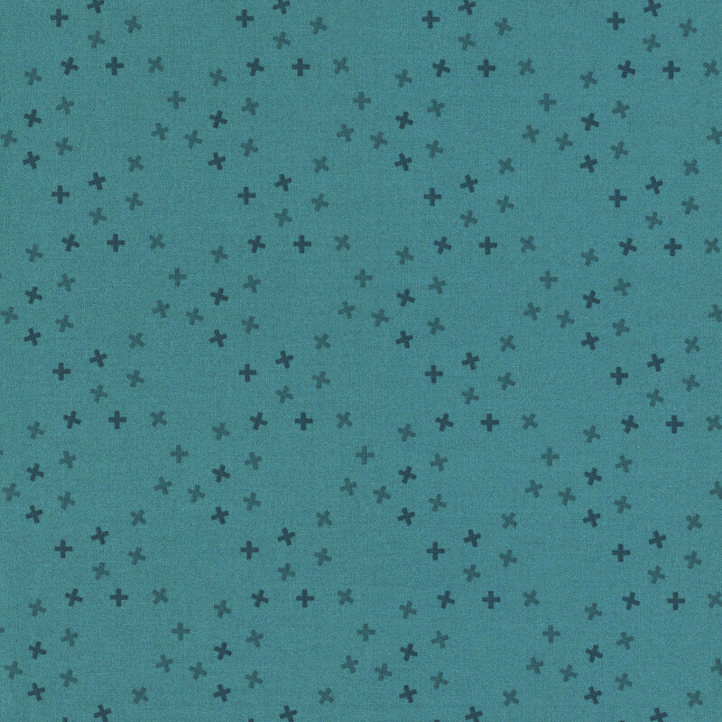 A teal blue fabric with tossed tonal x's in a large lattice pattern.