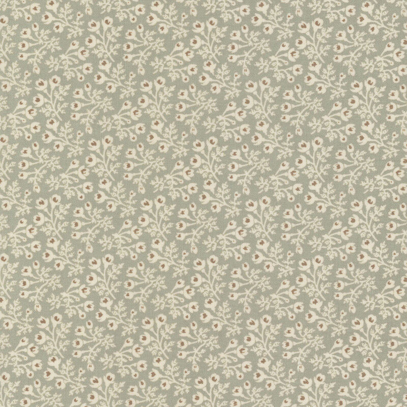 Floral pattern with small beige flowers and leaves on a muted green fabric.