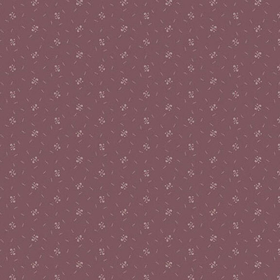 A purple fabric with tonal calico patterns scattered throughout.