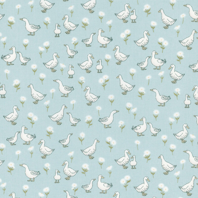 Light blue fabric featuring various white ducks and flowers.