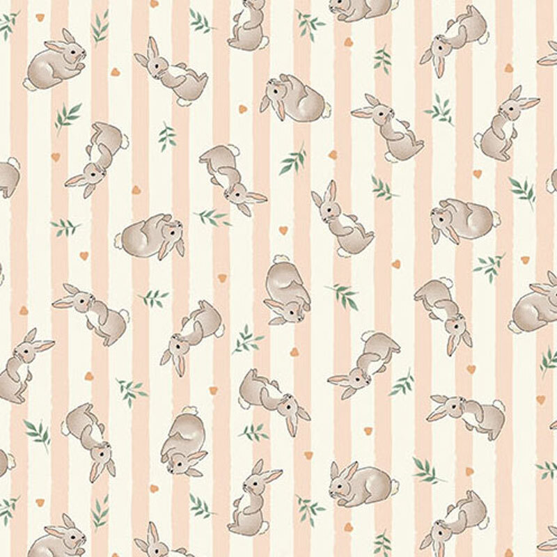 Fabric featuring gray rabbits and green leaves on a light peach and cream striped background.