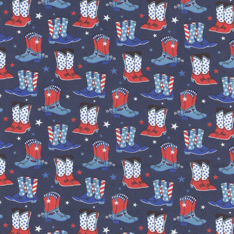 Pattern of red, white, and blue cowboy boots with stars on a dark blue fabric.