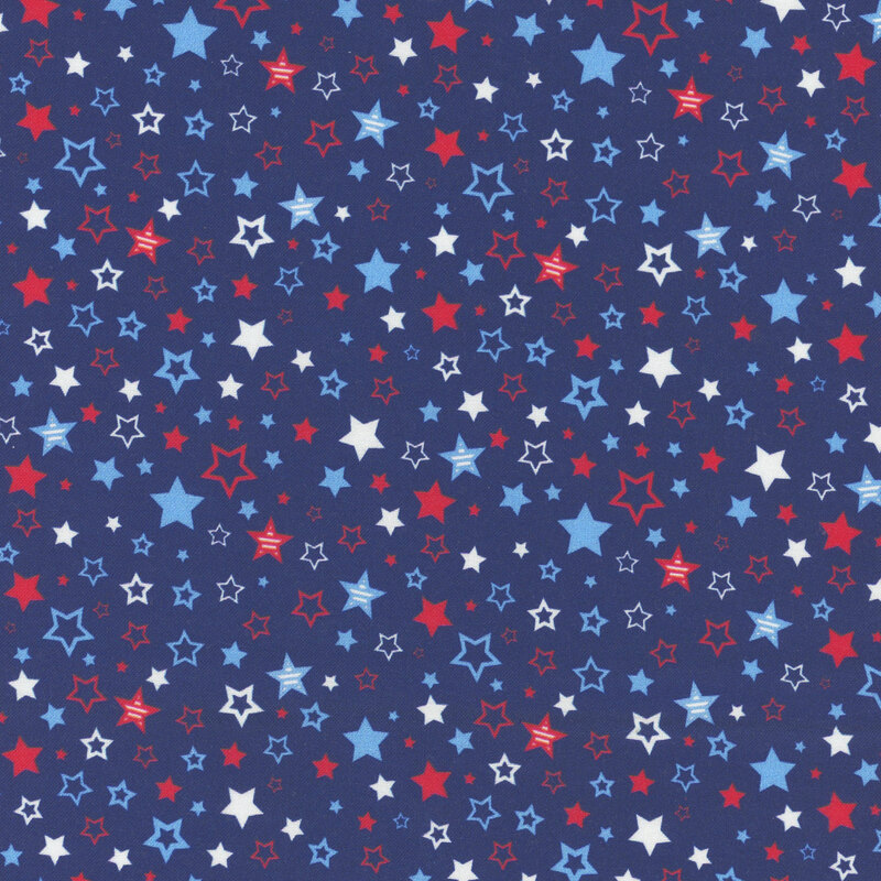 A blue fabric filled with various stars in red, white, and light blue colors.