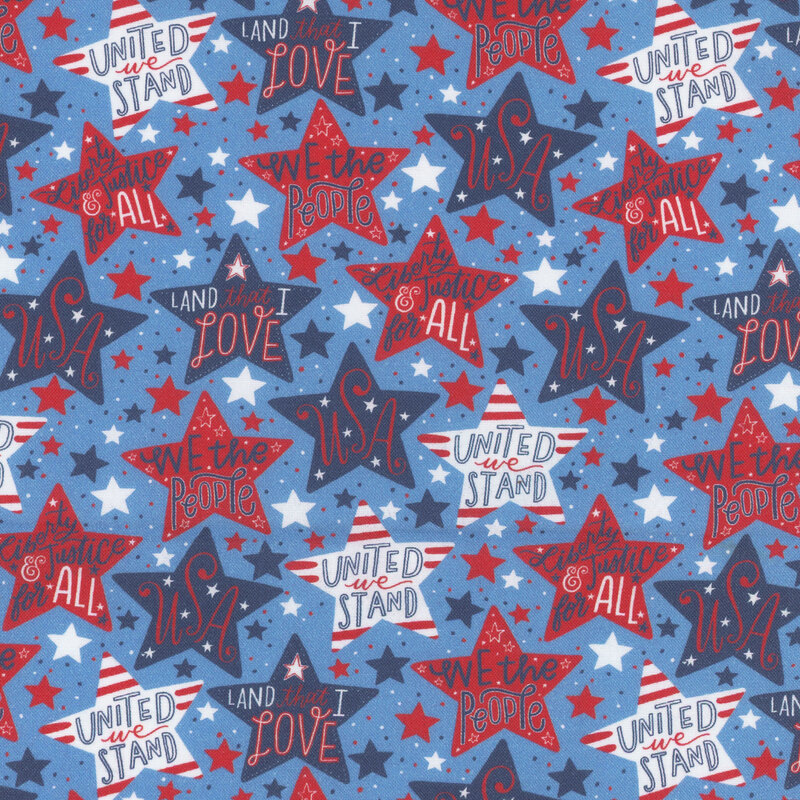 Fabric pattern of red, white, and blue stars featuring phrases like USA, We the People, and Land that I Love.