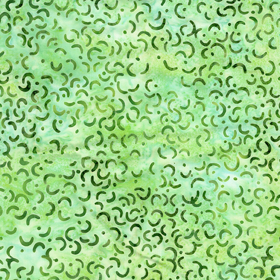 Mottled spring green batik swatch with dark green macaroni shapes and scattered dots.