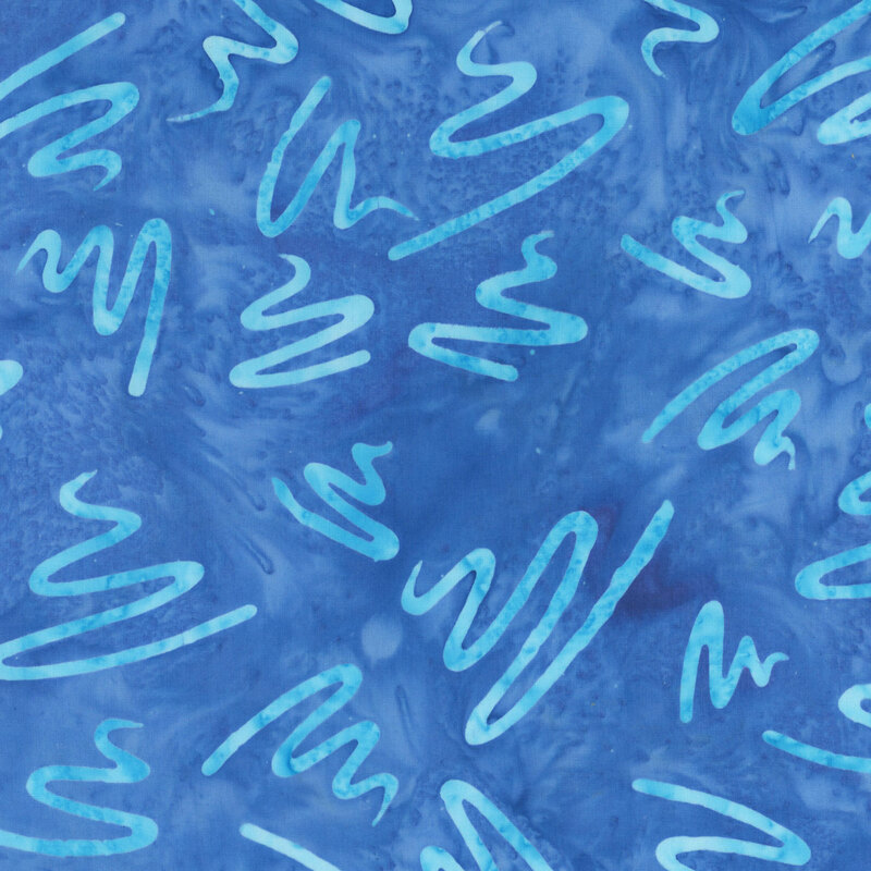 Mottled royal blue batik swatch with tossed sky blue squiggles.