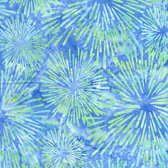 Mottled denim blue batik swatch with spring green firework starbursts.