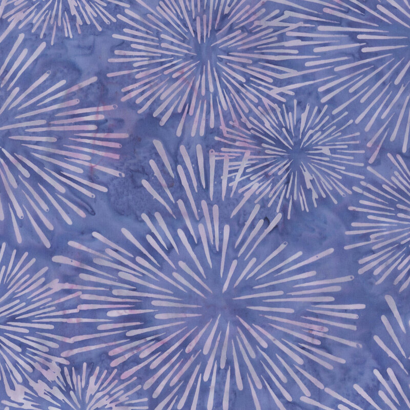 Mottled indigo batik swatch with wisteria purple firework starbursts.