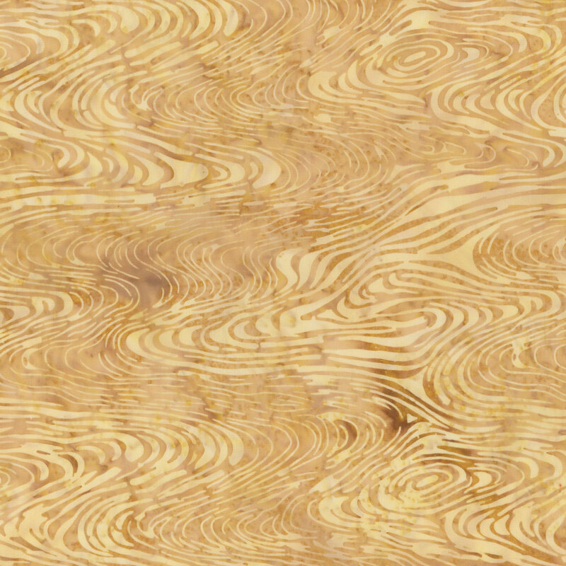 Abstract pattern of swirling golden shades on a textured background.
