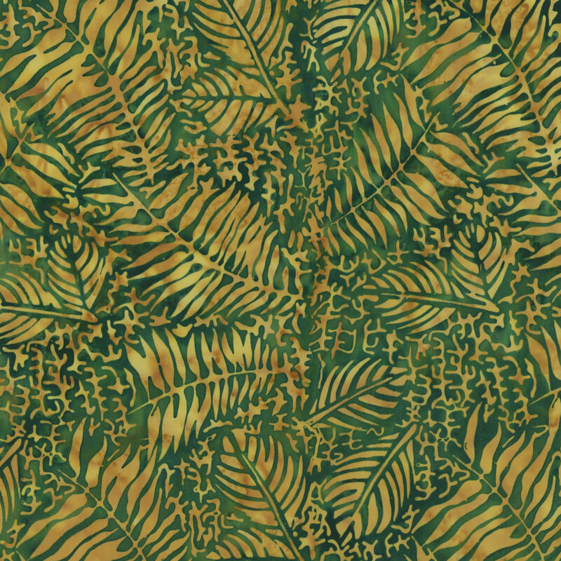 A dense pattern of gold leaves and ferns on a green background.