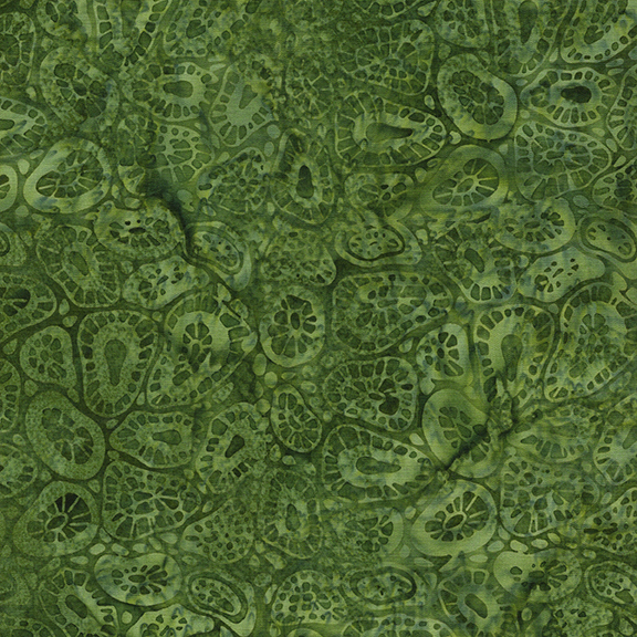 Green fabric featuring an intricate pattern of abstract shapes and forms.
