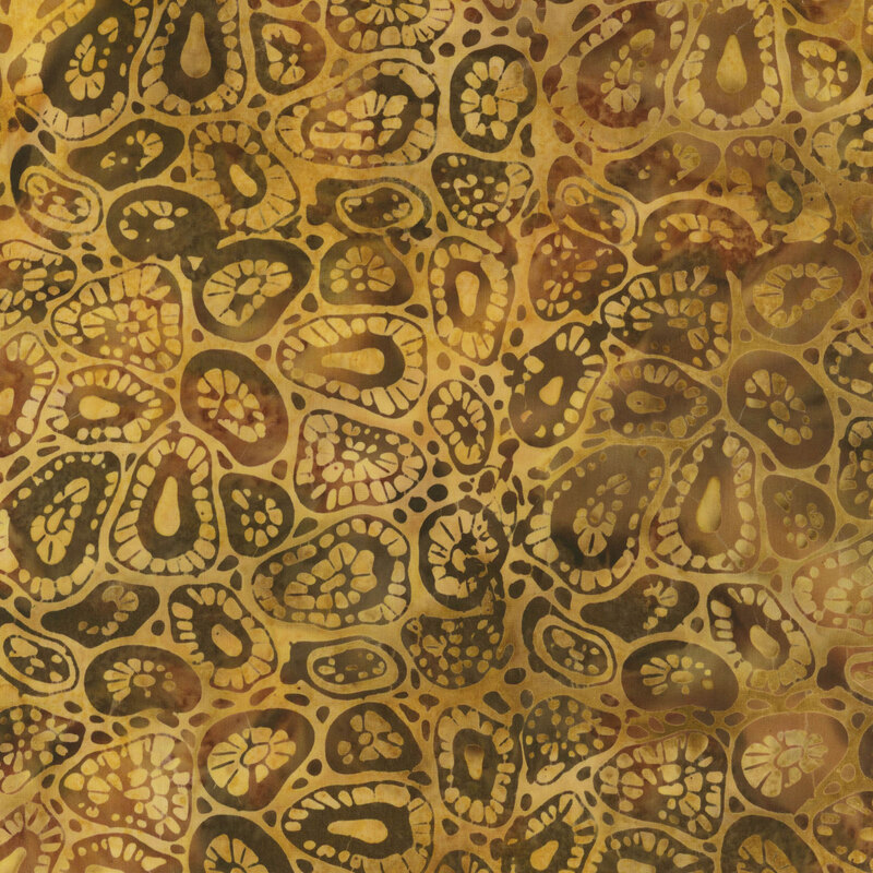 Abstract pattern of organic shapes in warm tones of orange, brown, and black on a fabric.