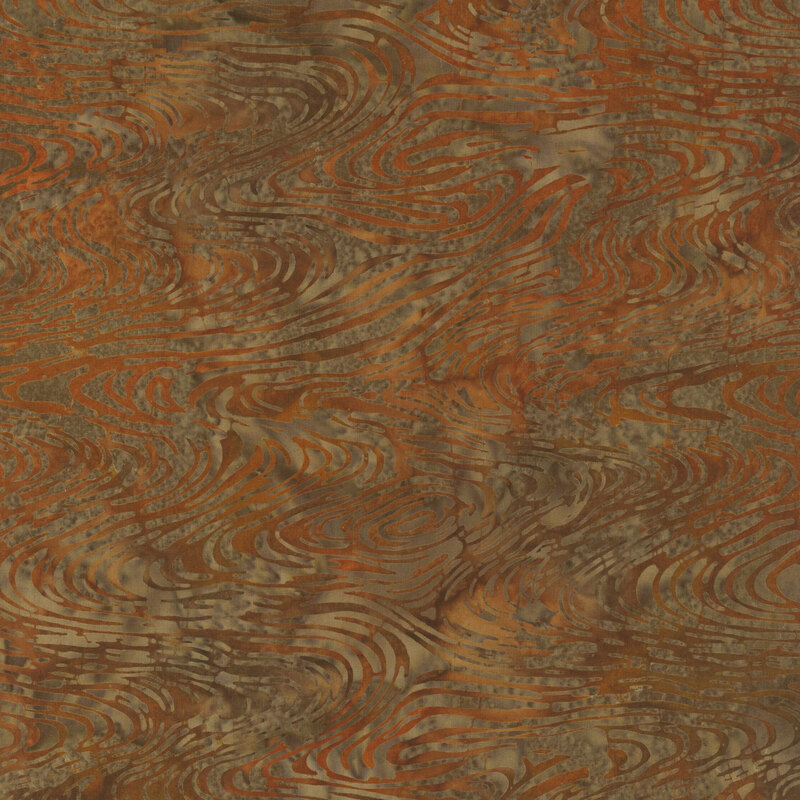 Abstract brown fabric pattern with swirling lines and texture variations, resembling wood grain.