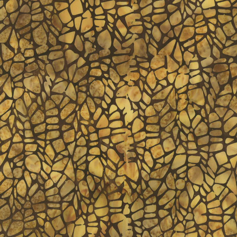 Brown and gold abstract pattern resembling irregularly shaped stones or pebbles.