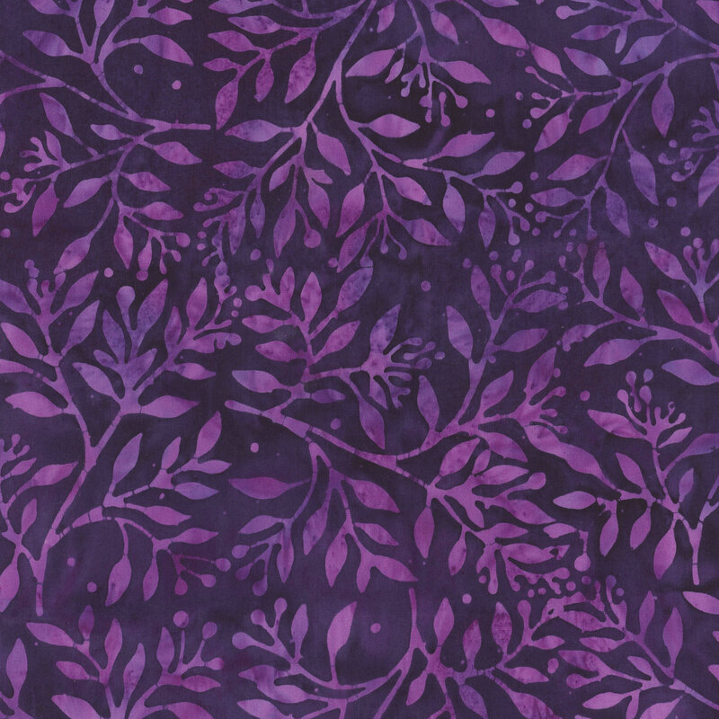 A patterned fabric featuring purple leaves and branches on a dark purple background.