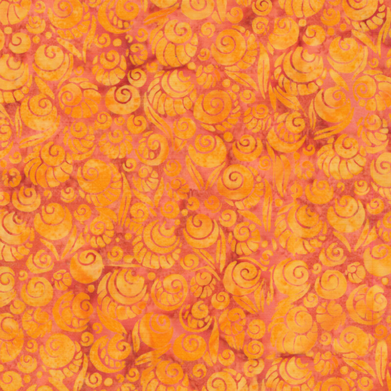 Mottled orange batik fabric with tonal swirls with designs to make them look like shells.