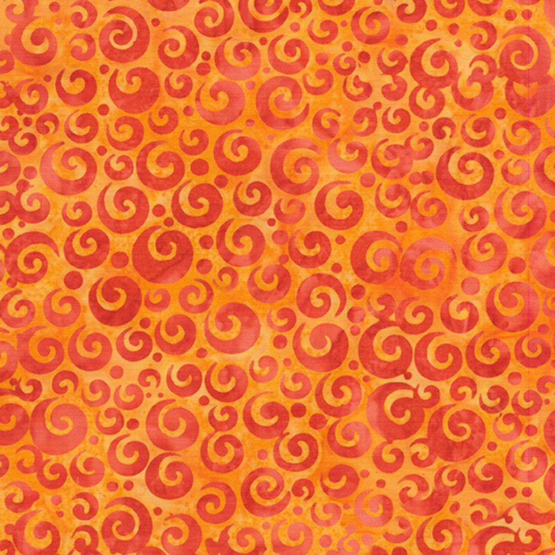 Mottled orange batik fabric with dark orange swirls and dots in varying sizes.