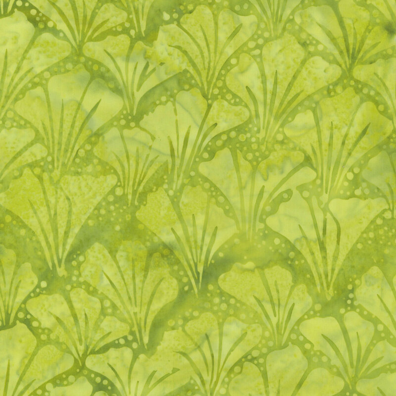 Mottled green batik fabric with overlapping rows of fanned out tonal flower petals.