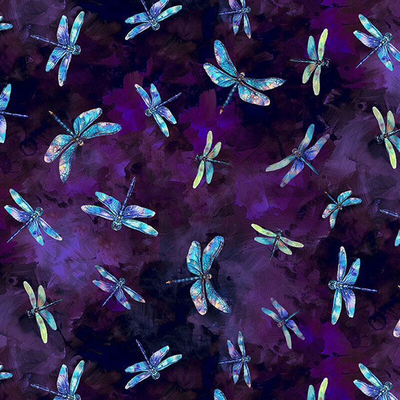 Fabric featuring colorful dragonflies on a dark purple abstract watercolor background.
