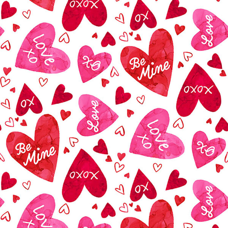 Vibrant pink and red hearts with white text set against a white background in a Valentine's Day theme from the Forever Love collection.