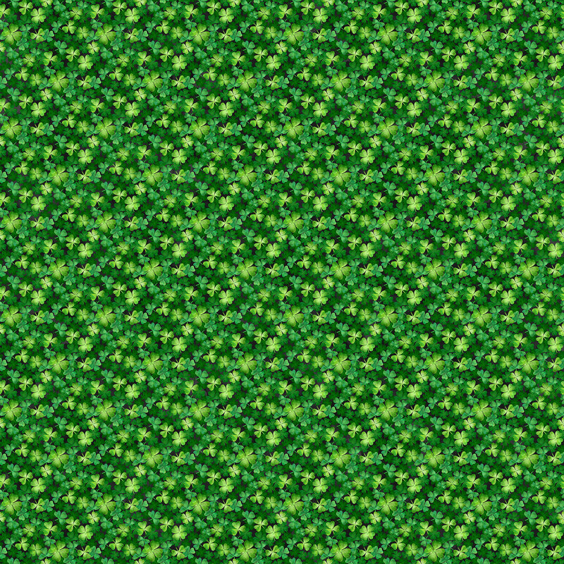 Seamless pattern of lush green leaves covering the entire fabric.
