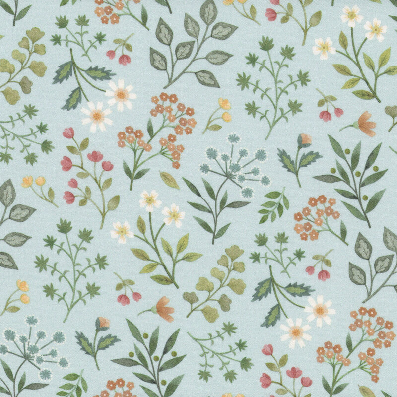 Light blue fabric featuring various colorful flowers and green leaves.