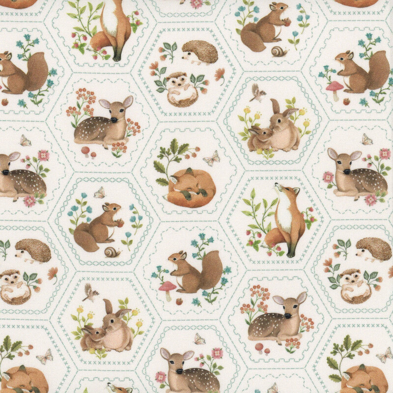Cream fabric featuring a honeycomb design of woodland animals, including deer, foxes, and hedgehogs, among florals and mushrooms.