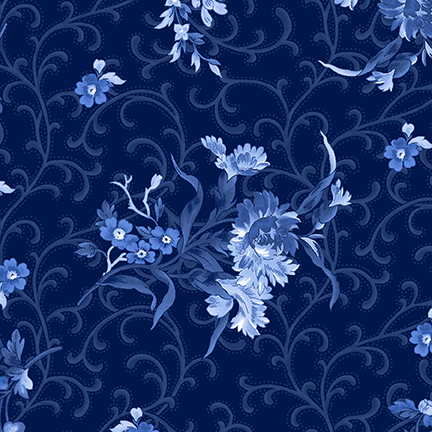 Dark navy fabric with blue florals and curling ornamental accents.