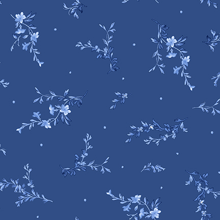 Navy blue fabric with tossed leafy sprigs and small dots.