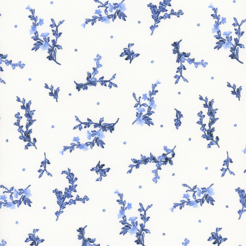 White fabric with tossed leafy sprigs and small dots.
