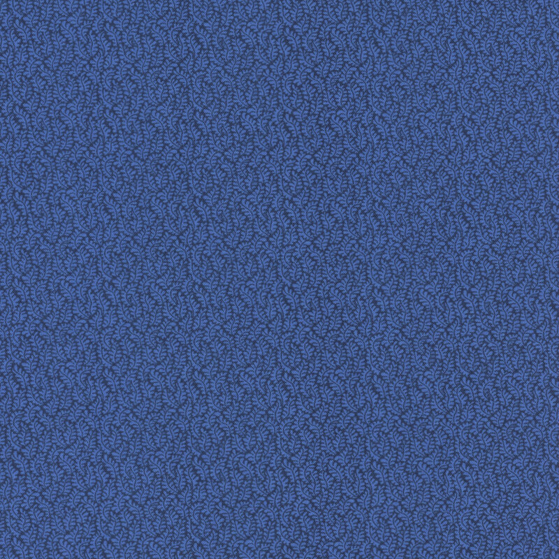 Navy blue fabric covered in a tonal leafy fern pattern.