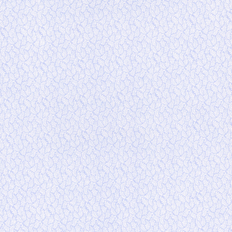 Periwinkle blue fabric covered in a leafy fern pattern.