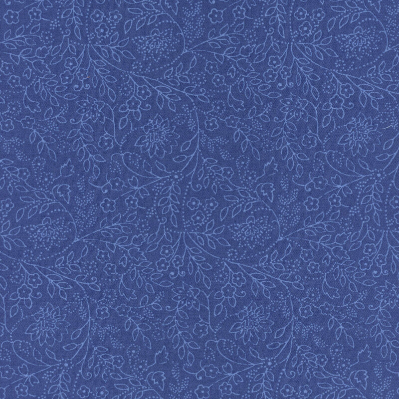 Blue fabric with tonal sprawling leaf and floral outlines.