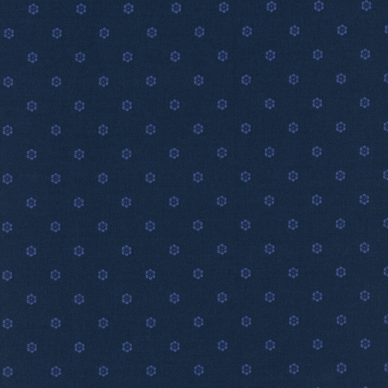 Navy blue fabric with a neat design of tonal hexagonal florals.