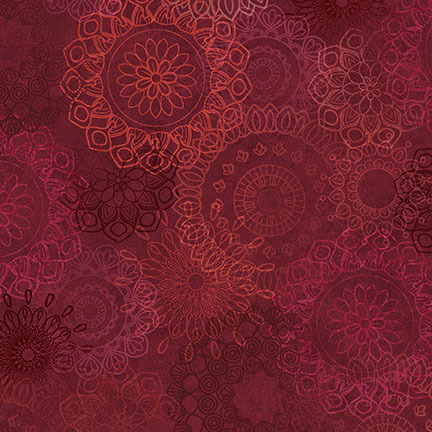 Red and maroon fabric featuring intricate, overlapping mandala patterns in various sizes.