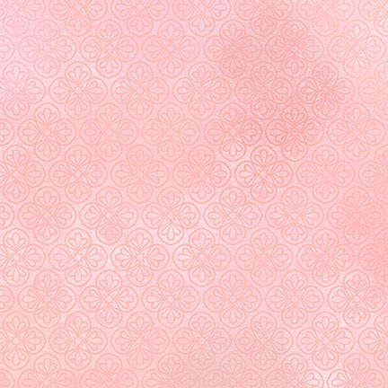A soft pink fabric featuring a repeating floral pattern.