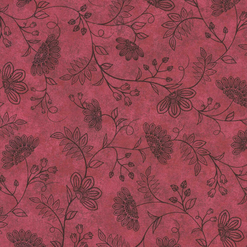 Mottled red fabric with black ornamental vines and flowers