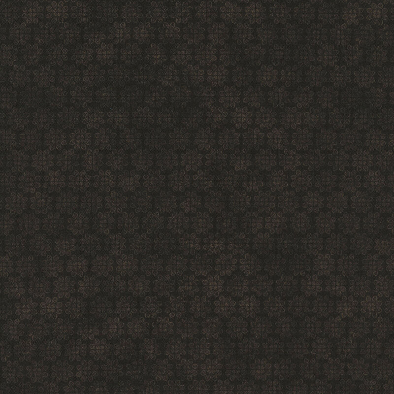 Black fabric featuring a subtle pattern of small floral shapes.