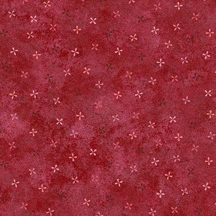 Red fabric with small, scattered pink and orange floral patterns.