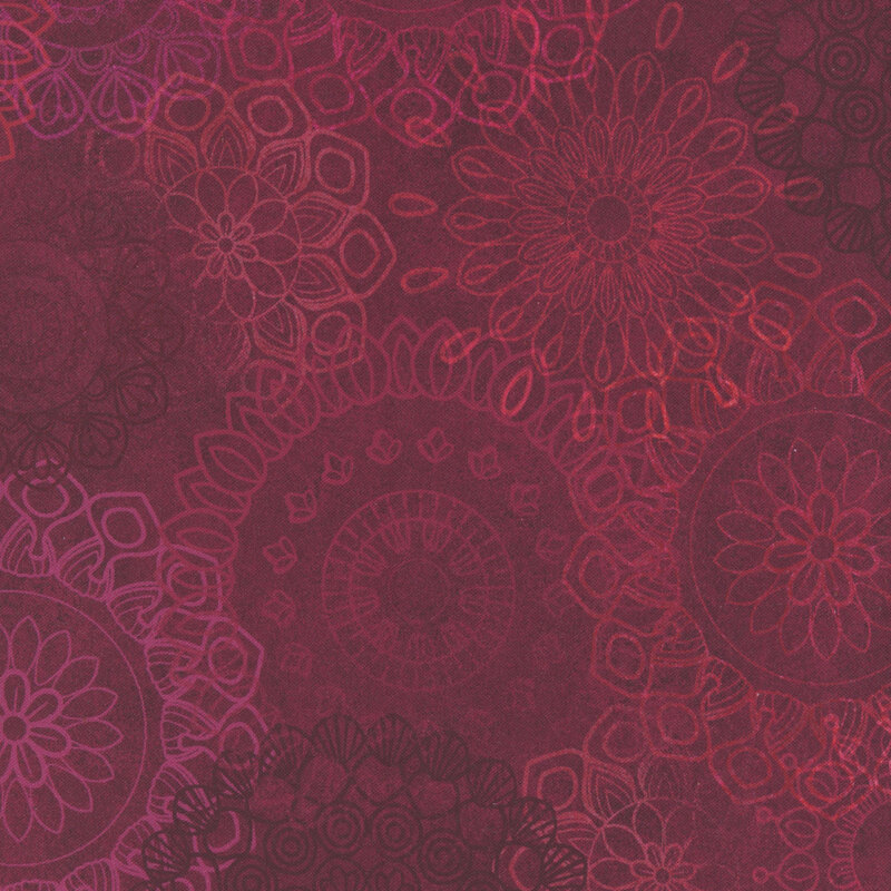 Intricate red and orange mandala patterns on a deep burgundy background creating a textured design.
