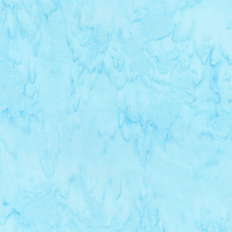 Aqua blue batik fabric featuring a mottled watercolor design.