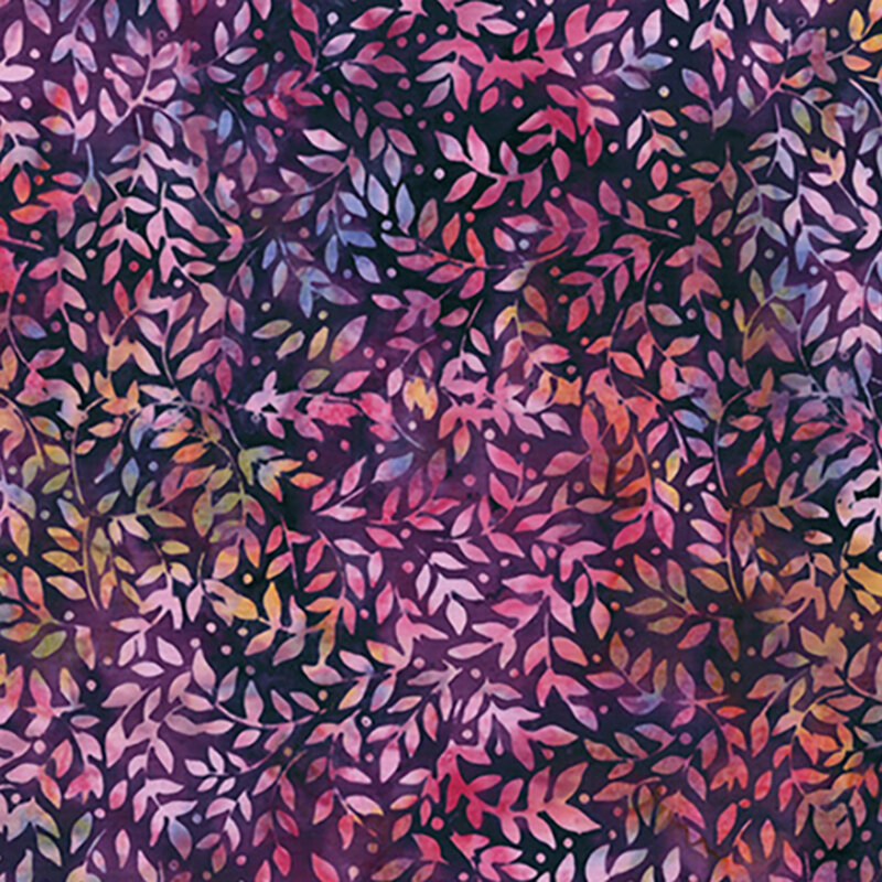 Mottled purple fabric with a sprawling design of multicolored leaves.