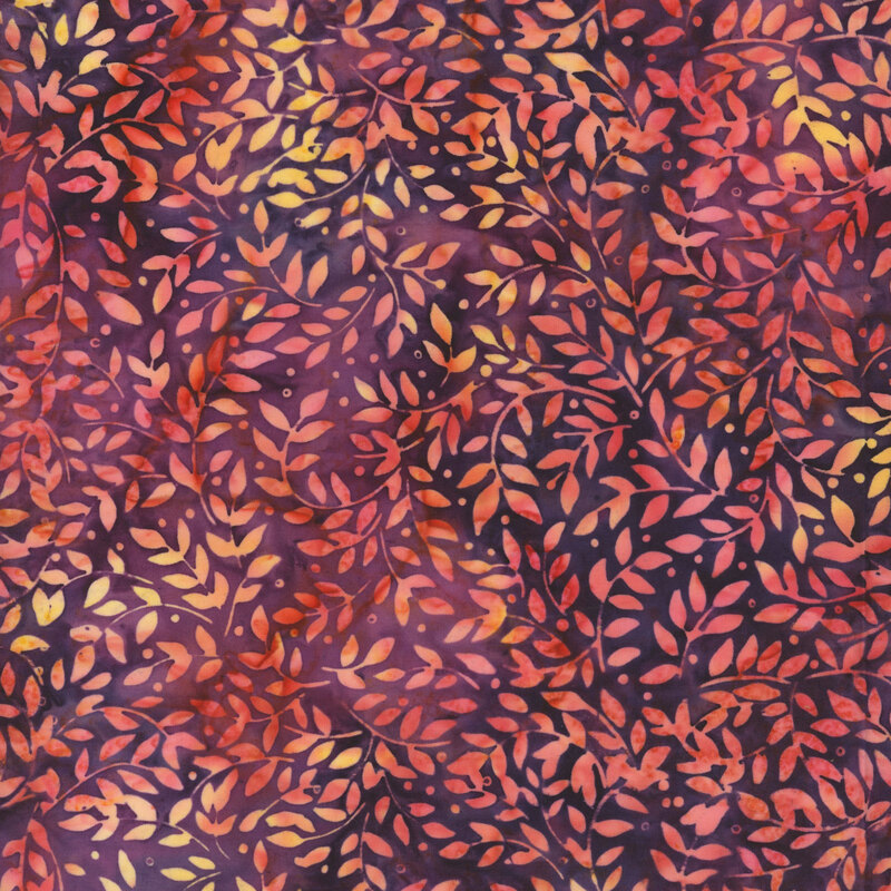 Mottled purple fabric with a sprawling design of yellow and peach leaves.