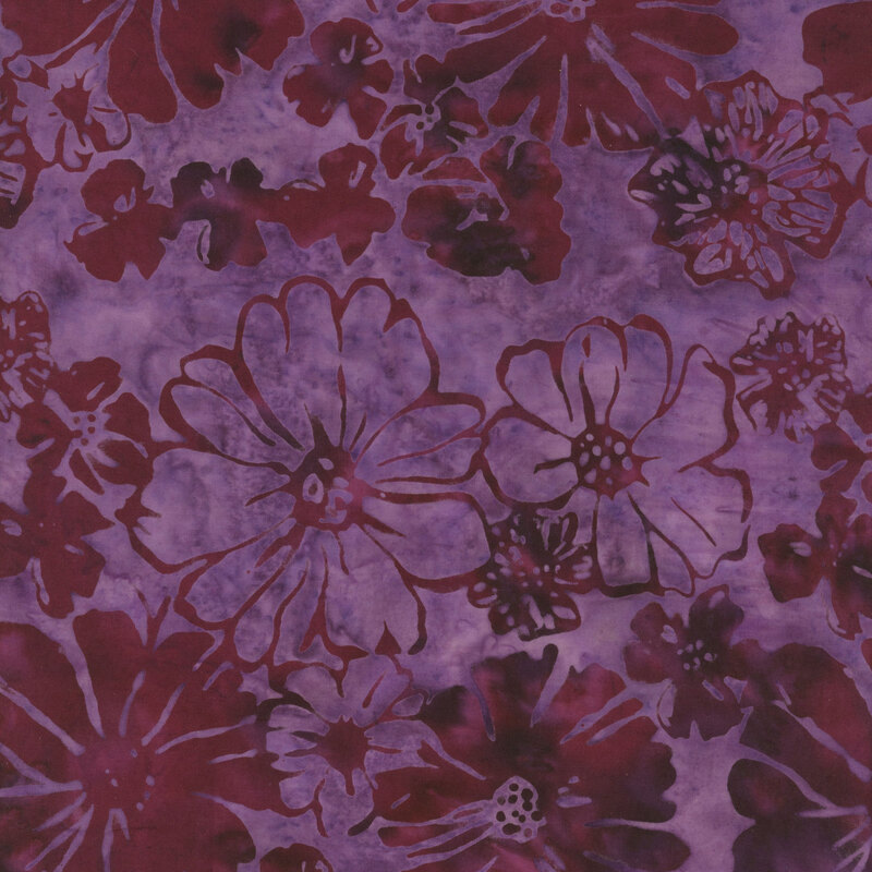 Mottled purple fabric with dark purple floral silhouettes.