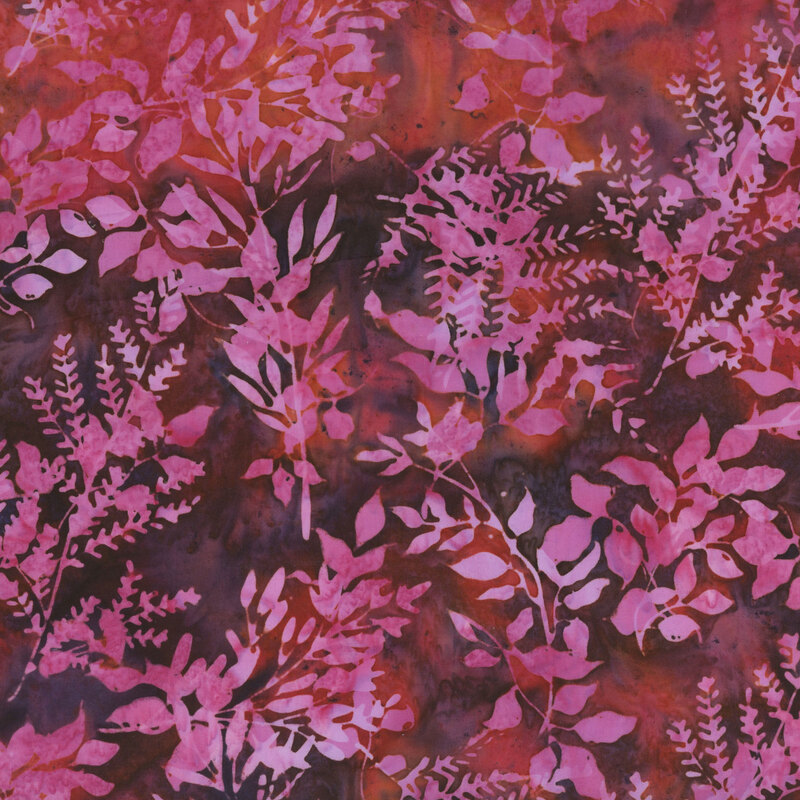 Mottled purple and red fabric with pink silhouettes of leafy sprigs.