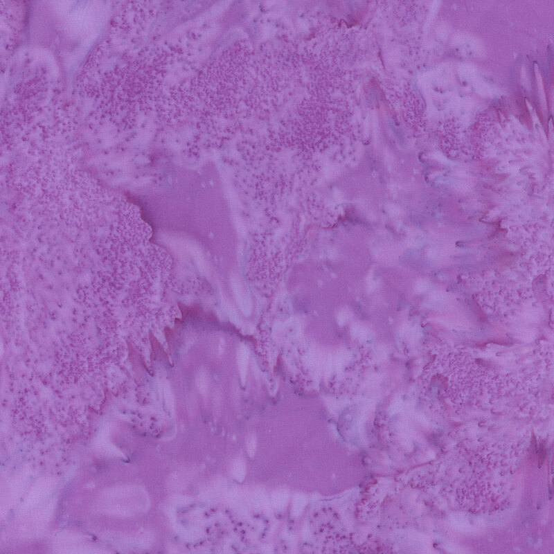 Light purple batik fabric featuring a mottled watercolor design.
