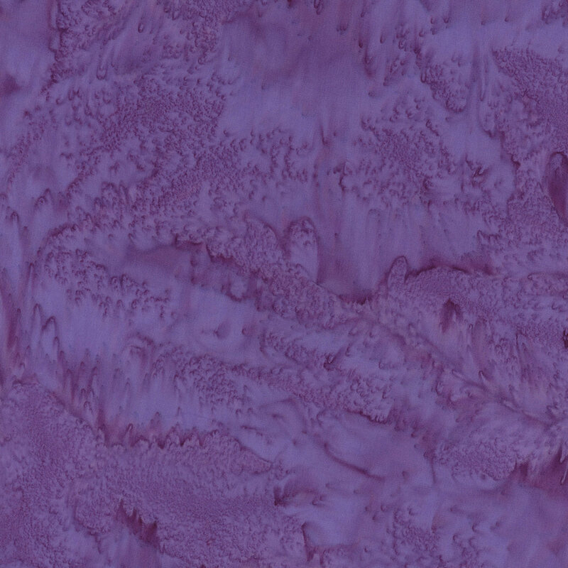 Plum batik fabric featuring a mottled watercolor design.