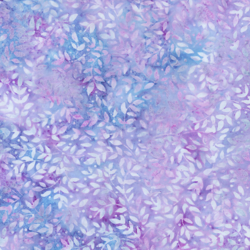 A pattern of tonal leaf silhouettes tossed on a mottled purple and blue fabric.