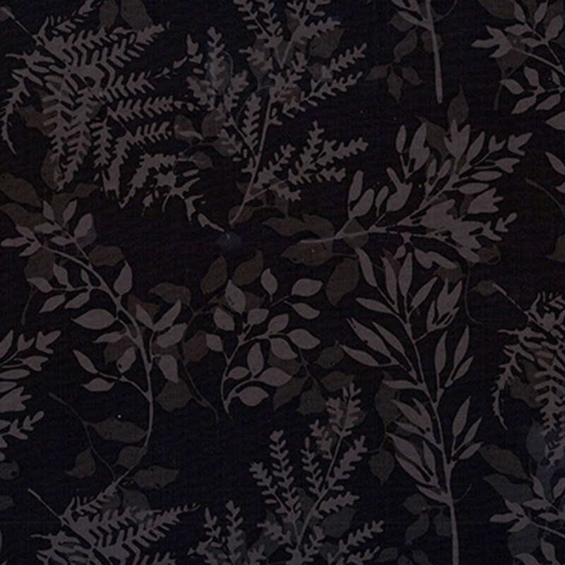 A tonal soft black leaf silhouettes tossed on a black fabric.
