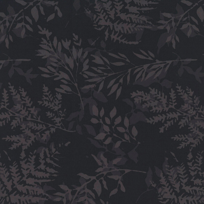 A tonal charcoal gray leaf silhouettes tossed on a soft black fabric.